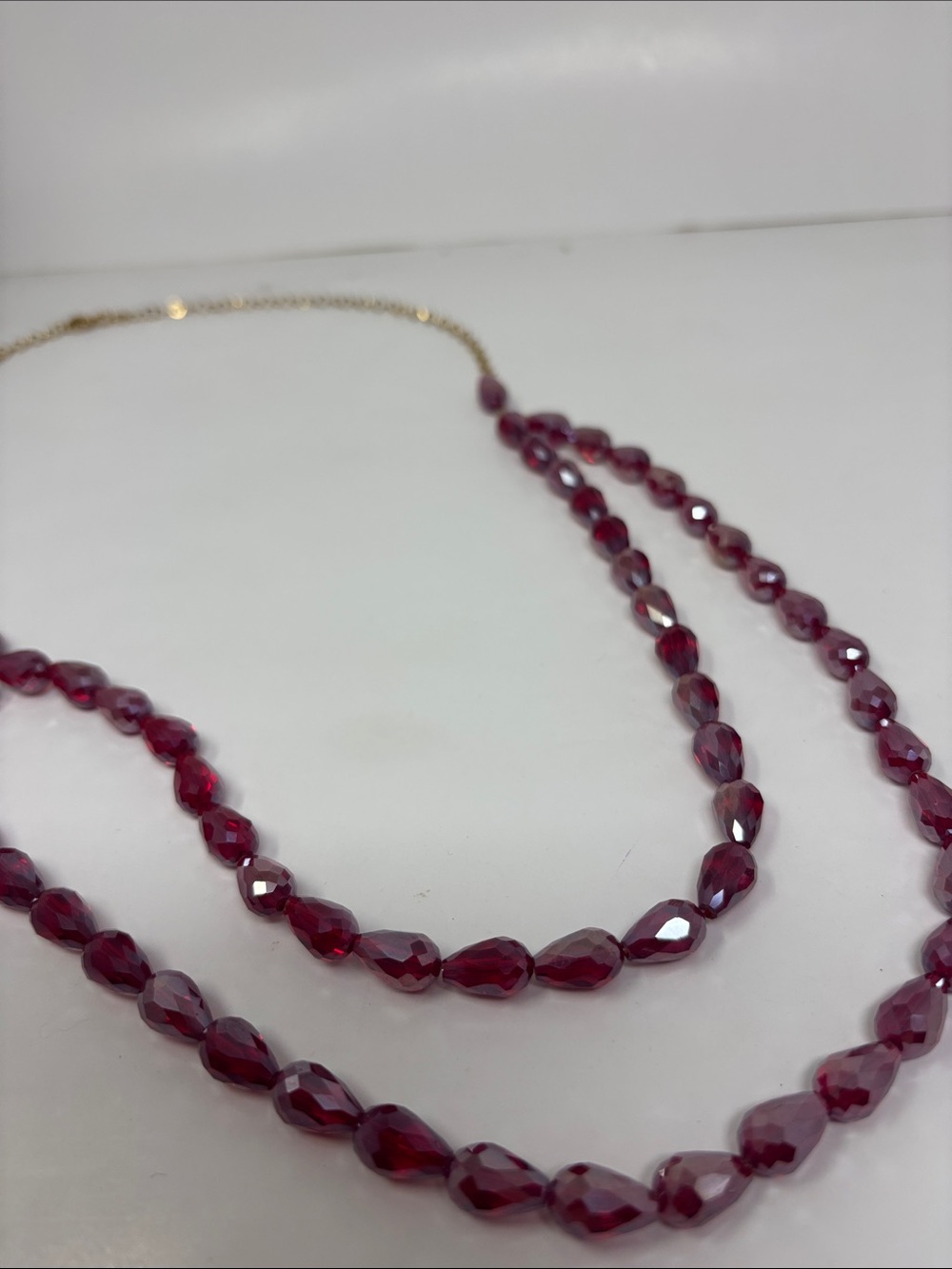 Gold-Tone Double Strand Necklace with Deep Red Faceted Beads